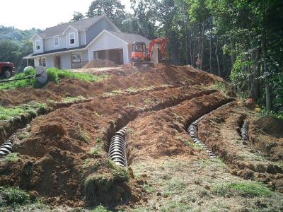 Septic system dug up in residential yard